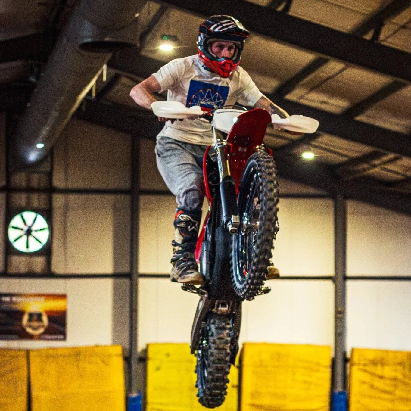 Go Off Road rider performing a wheelie on an electric bike